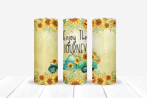 Yellow tumbler with sunflower boarder and vintage pickup truck "Enjoy the Journey" slim/skinny 20 oz stainless steel tumbler with clear lid.