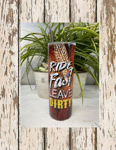 Tire track background "Ride Fast Leave Dirty" slim/skinny 20 oz stainless steel tumbler with clear lid with stainless steel straw.