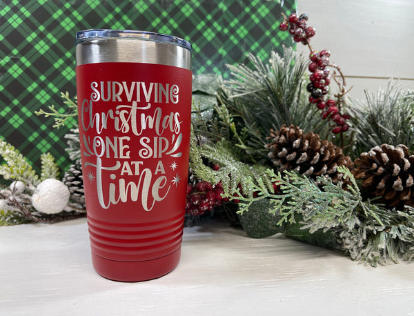 Surviving Christmas One Sip at a Time, Christmas Theme 20 Ounce SS Double Wall Tumbler w/Clear Lid, Coffee Cup, Drink Tumbler, Travel Mug,